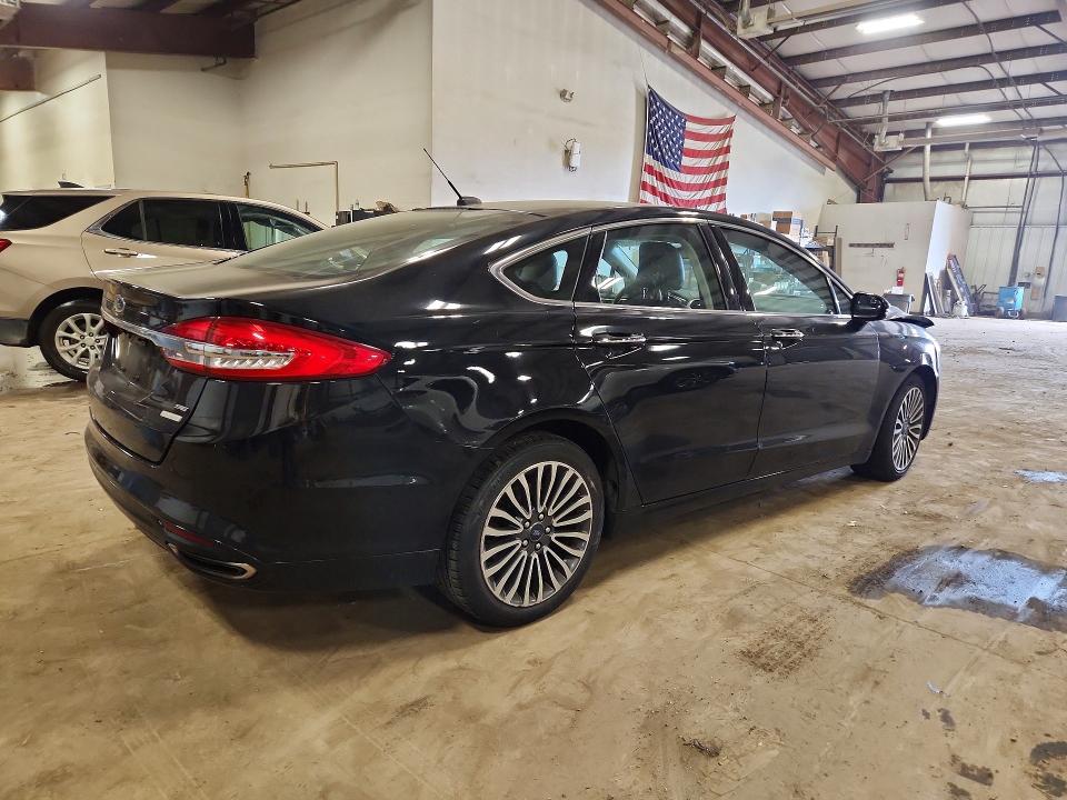 Photo 3 from auction – 2017 FORD FUSION with VIN 3FA6P0T91HR100884