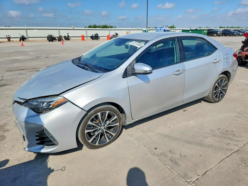 TOYOTA COROLLA 2017 with VIN 2T1BURHE3HC886236 - Photo from auction