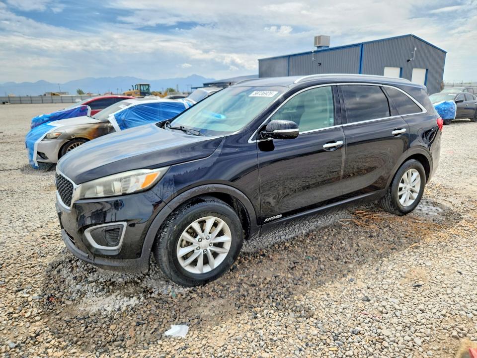 KIA SORENTO 2016 with VIN 5XYPGDA51GG072227 - Photo from auction