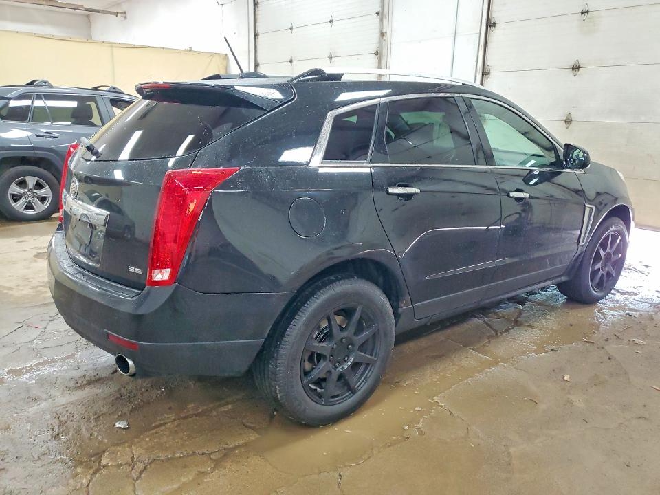 Photo 3 from auction – 2015 CADILLAC SRX with VIN 3GYFNEE31FS640693