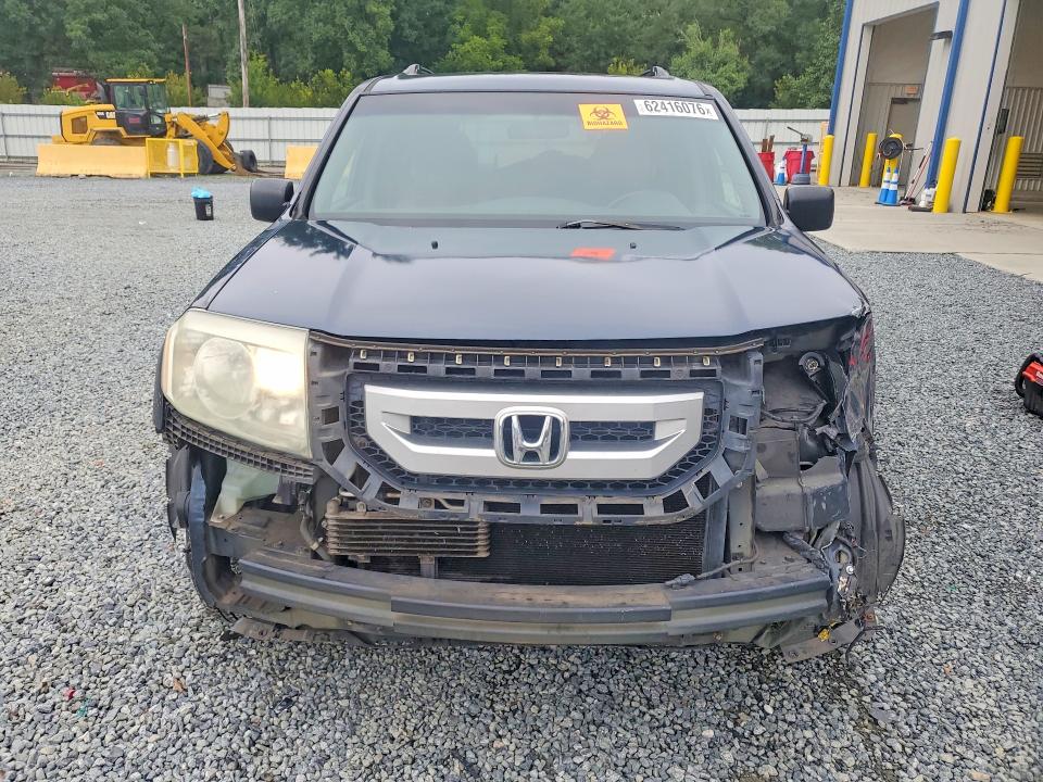 Снимка 5 от търг – 2011 HONDA PILOT с VIN 5FNYF3H22BB036995