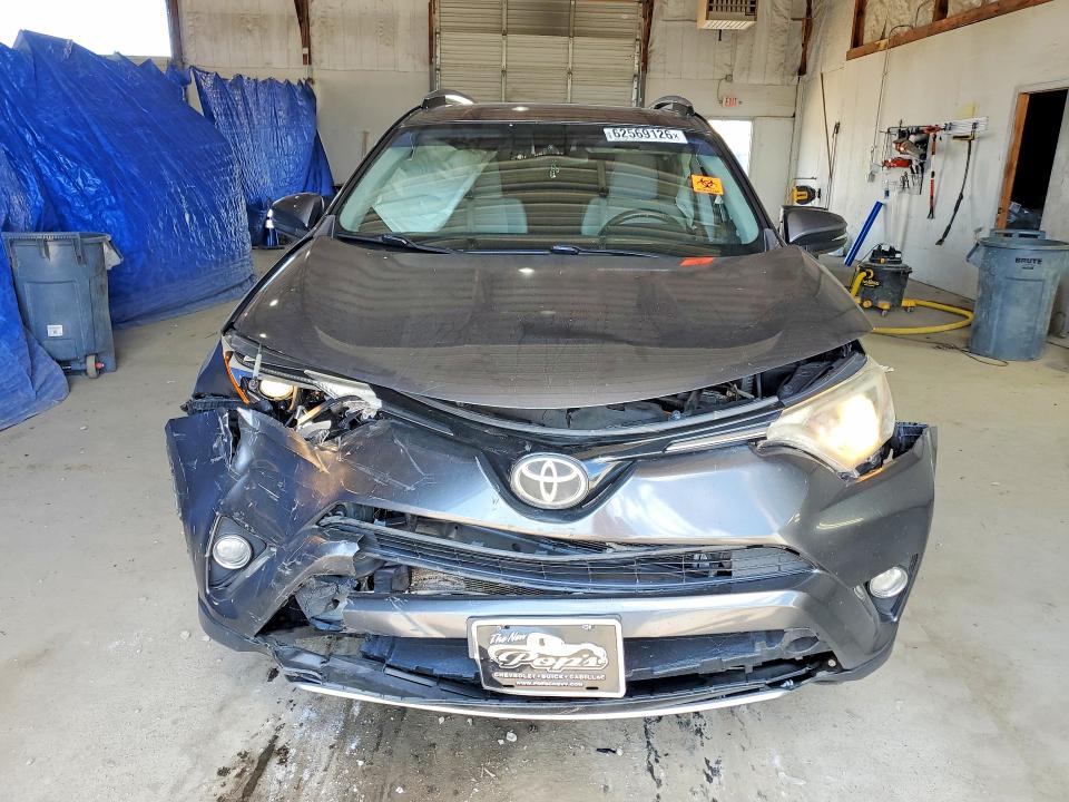 Photo 5 from auction – 2017 TOYOTA RAV4 with VIN JTMWFREV0HJ123305