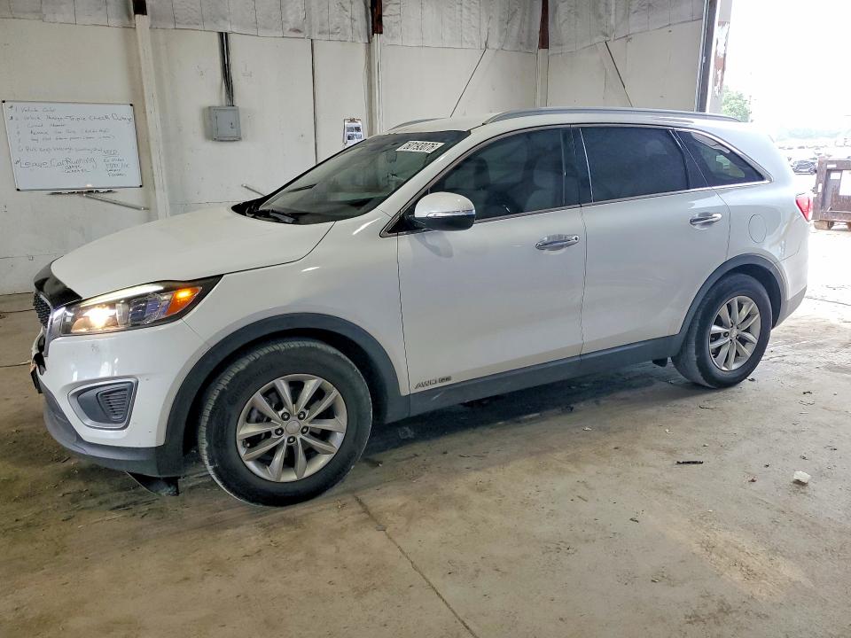 KIA SORENTO 2016 with VIN 5XYPGDA51GG039017 - Photo from auction