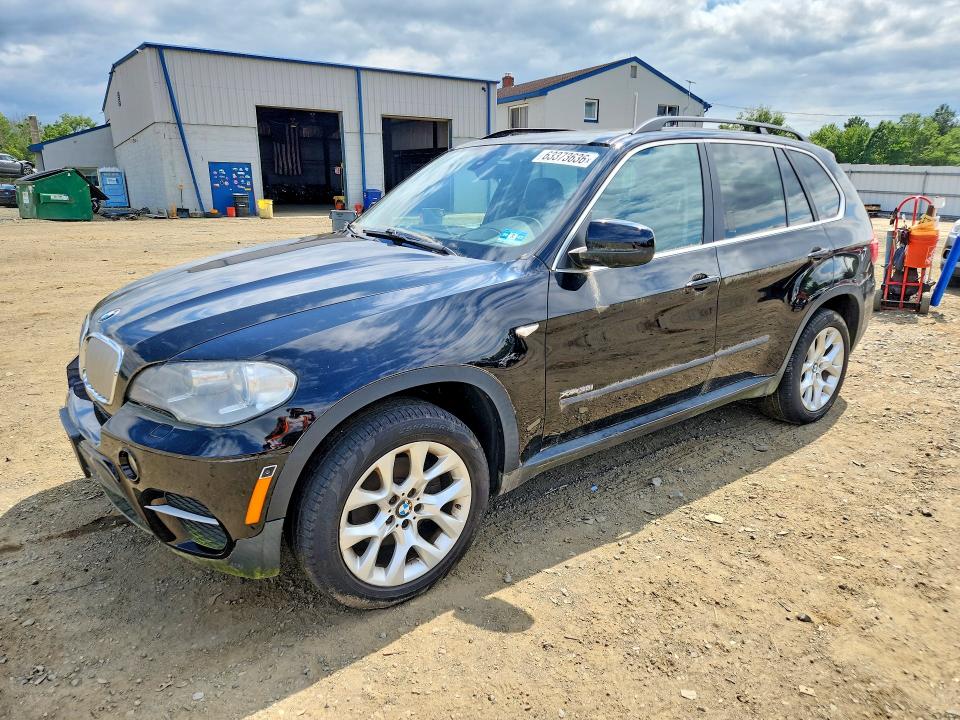 BMW X5 2013 с VIN 5UXZV4C56D0B24093 - Фото с аукциона