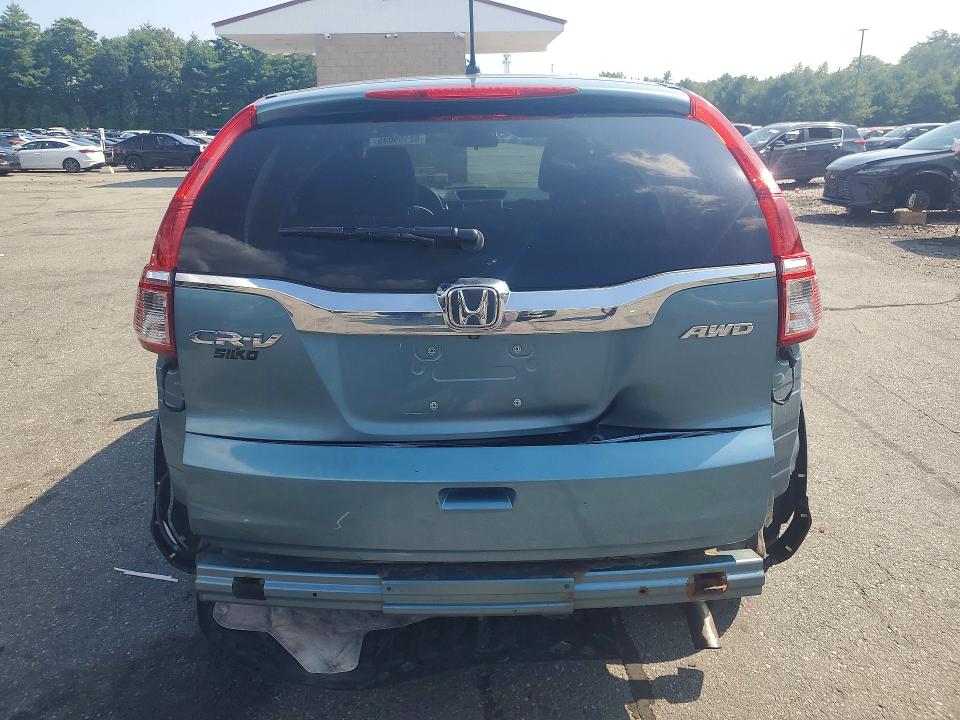 Photo 6 from auction – 2015 HONDA CR-V with VIN 2HKRM4H55FH705911