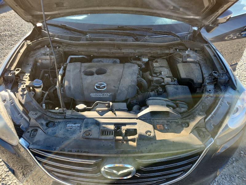Photo 12 from auction – 2016 MAZDA CX-5 with VIN JM3KE4CY7G0911270