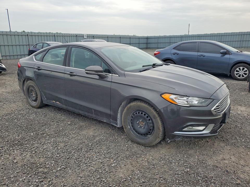 Photo 4 from auction – 2017 FORD FUSION with VIN 3FA6P0H74HR389945