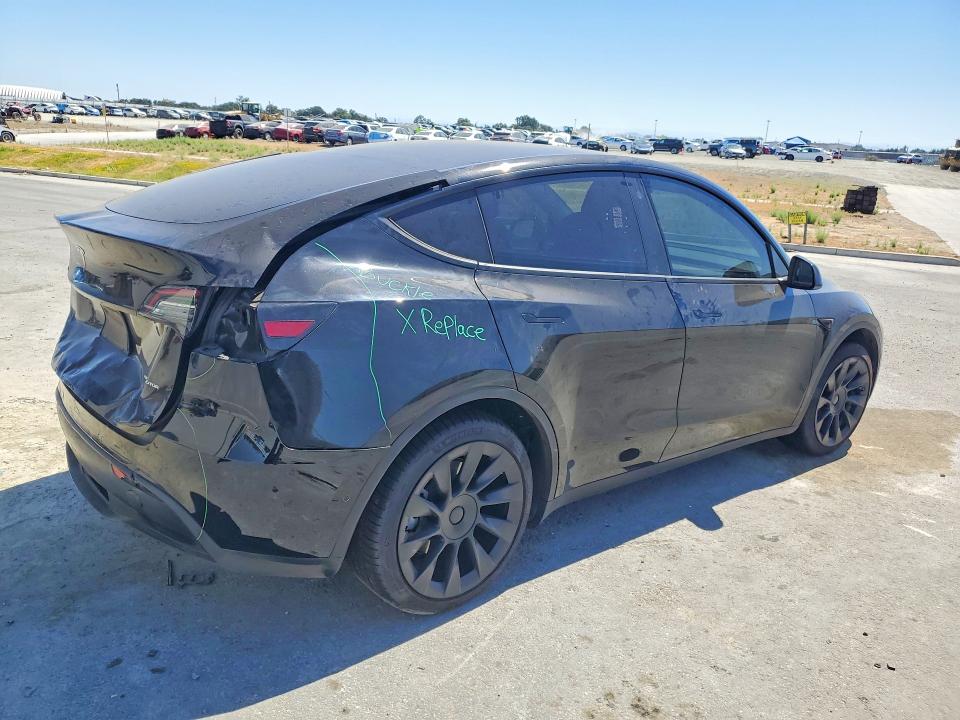 Photo 3 from auction – 2022 TESLA MODEL Y with VIN 7SAYGAEE7NF555550