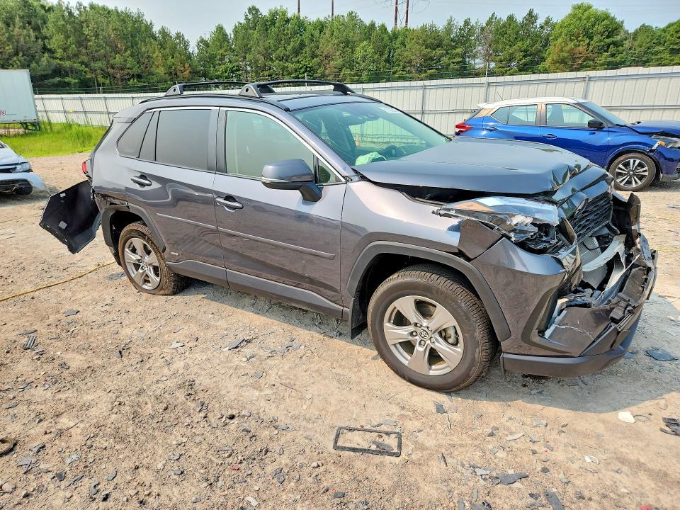 Photo 4 from auction – 2023 TOYOTA RAV4 HYBRID with VIN JTMRWRFV5PD188093