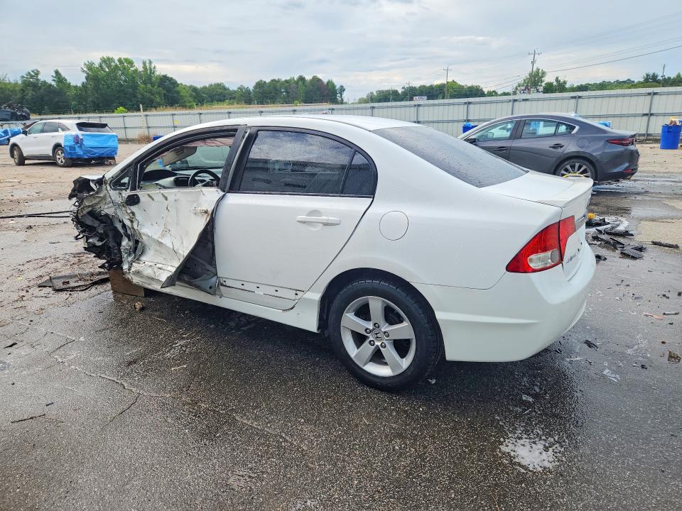 Photo 2 from auction – 2011 HONDA CIVIC with VIN 19XFA1F60BE015715