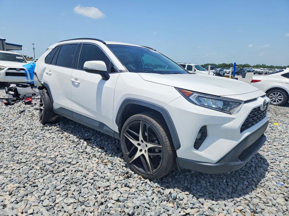 Photo 4 from auction – 2021 TOYOTA RAV4 with VIN 2T3W1RFV5MC104050