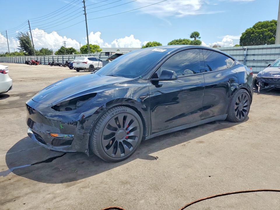TESLA MODEL Y 2023 с VIN 7SAYGDEF8PF704867 - Снимка от търг
