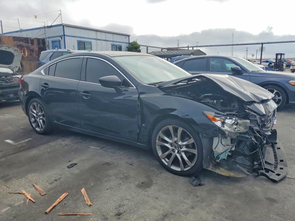 Photo 4 from auction – 2014 MAZDA 6 with VIN JM1GJ1W5XE1109474