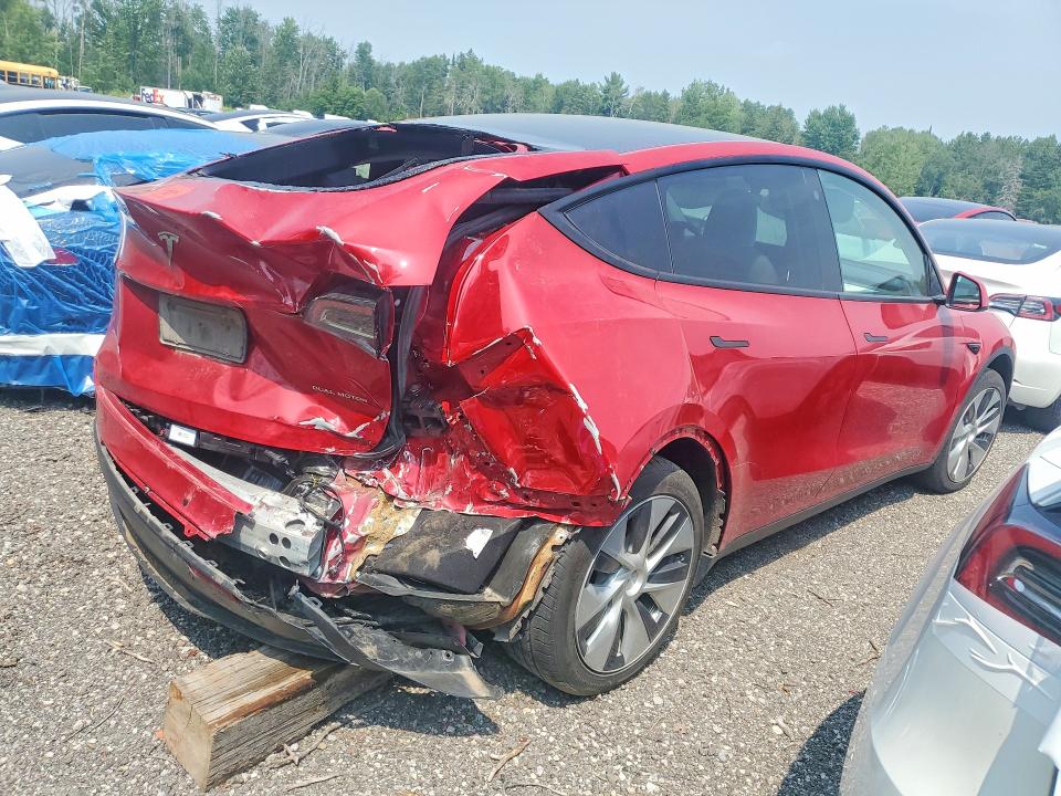 Photo 3 from auction – 2022 TESLA MODEL Y with VIN 7SAYGAEE5NF518576