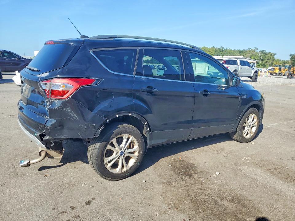 Photo 3 from auction – 2018 FORD ESCAPE with VIN 1FMCU9GD1JUA73964