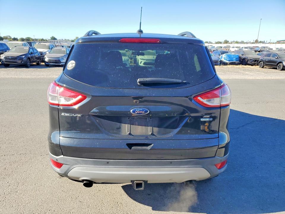 Photo 6 from auction – 2014 FORD ESCAPE with VIN 1FMCU9G98EUE41056