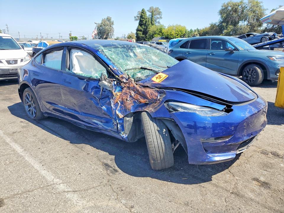 Photo 4 from auction – 2022 TESLA MODEL 3 with VIN 5YJ3E1EBXNF241426