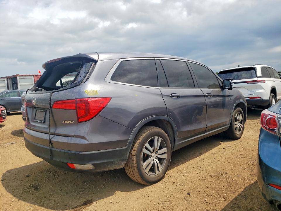 Photo 3 from auction – 2016 HONDA PILOT with VIN 5FNYF6H54GB112882