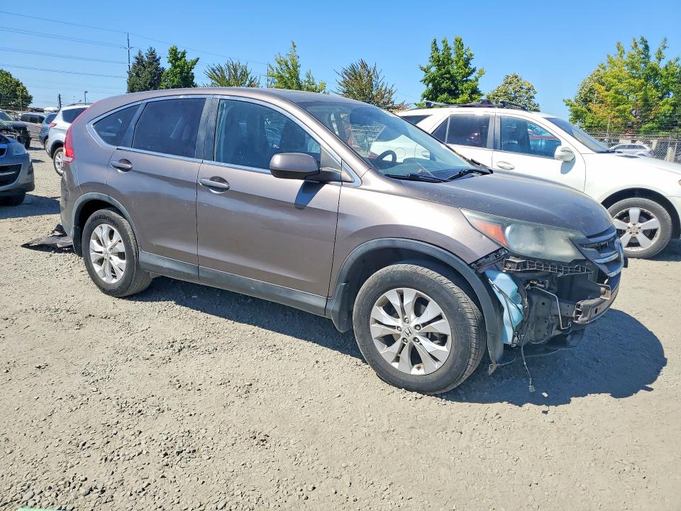 Photo 4 from auction – 2014 HONDA CR-V with VIN 2HKRM4H5XEH634073