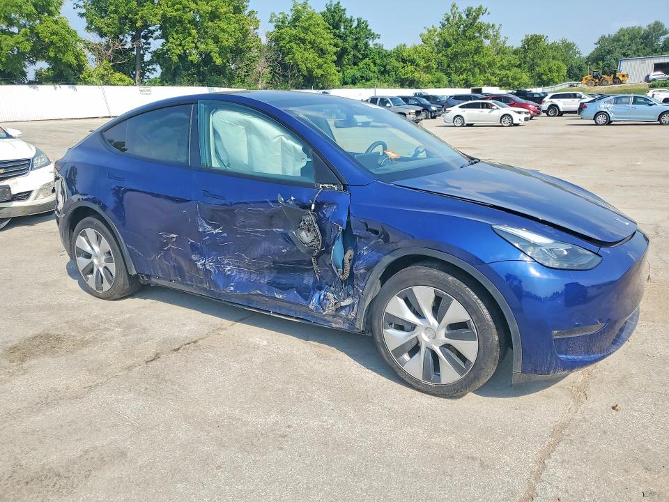 Photo 4 from auction – 2023 TESLA MODEL Y with VIN 7SAYGAEE2PF670690