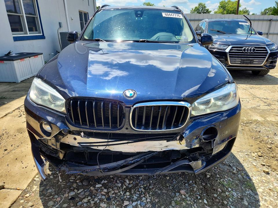 Photo 5 from auction – 2014 BMW X5 with VIN 5UXKR0C5XE0K47361