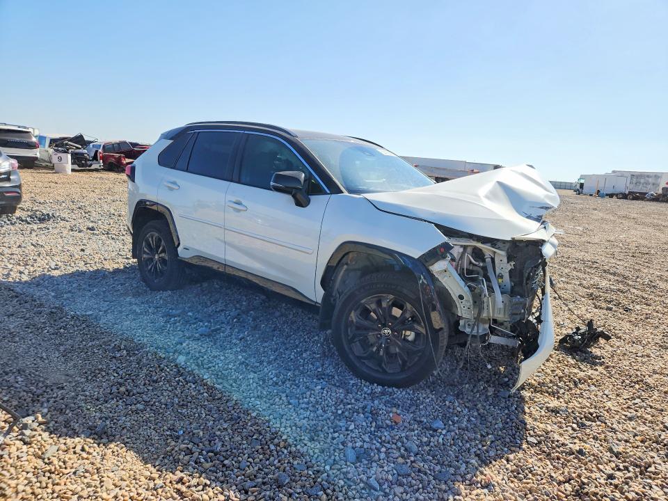 Photo 4 from auction – 2022 TOYOTA RAV4 with VIN 4T3E6RFV9NU093941