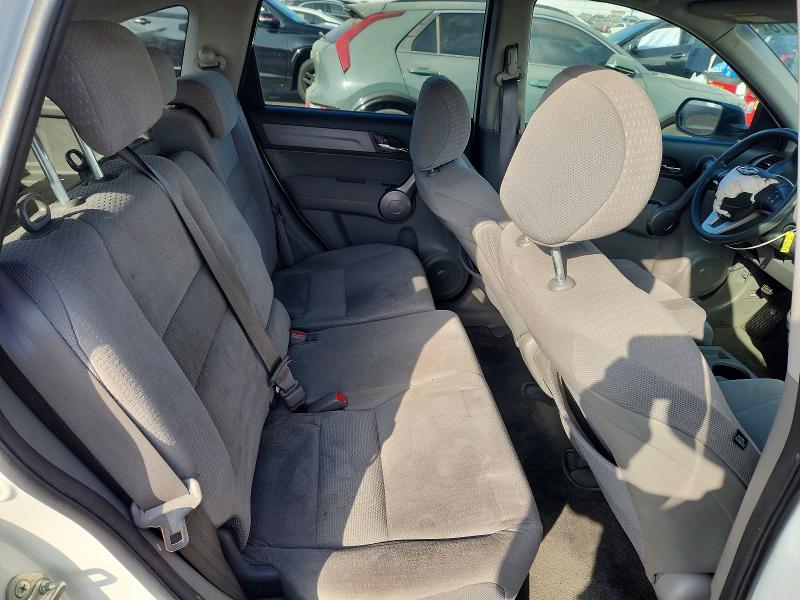 Photo 11 from auction – 2009 HONDA CR-V with VIN 5J6RE385X9L034138