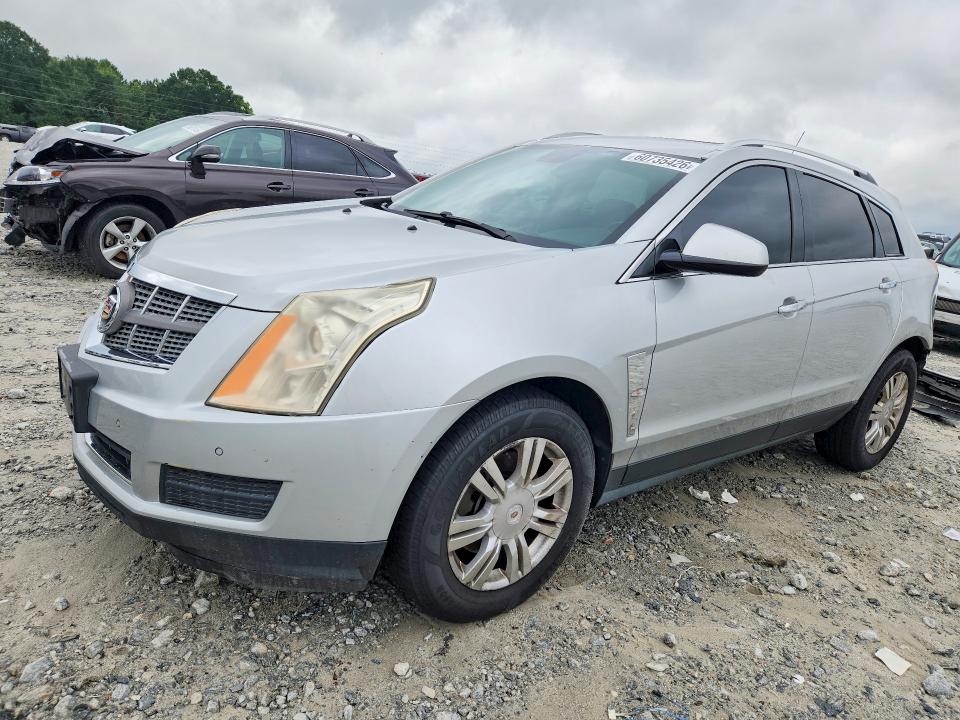 CADILLAC SRX 2011 with VIN 3GYFNAEY9BS679269 - Photo from auction