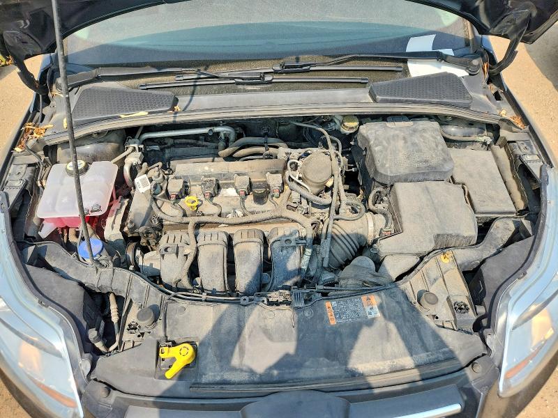 Photo 11 from auction – 2014 FORD FOCUS with VIN 1FADP3K22EL384601