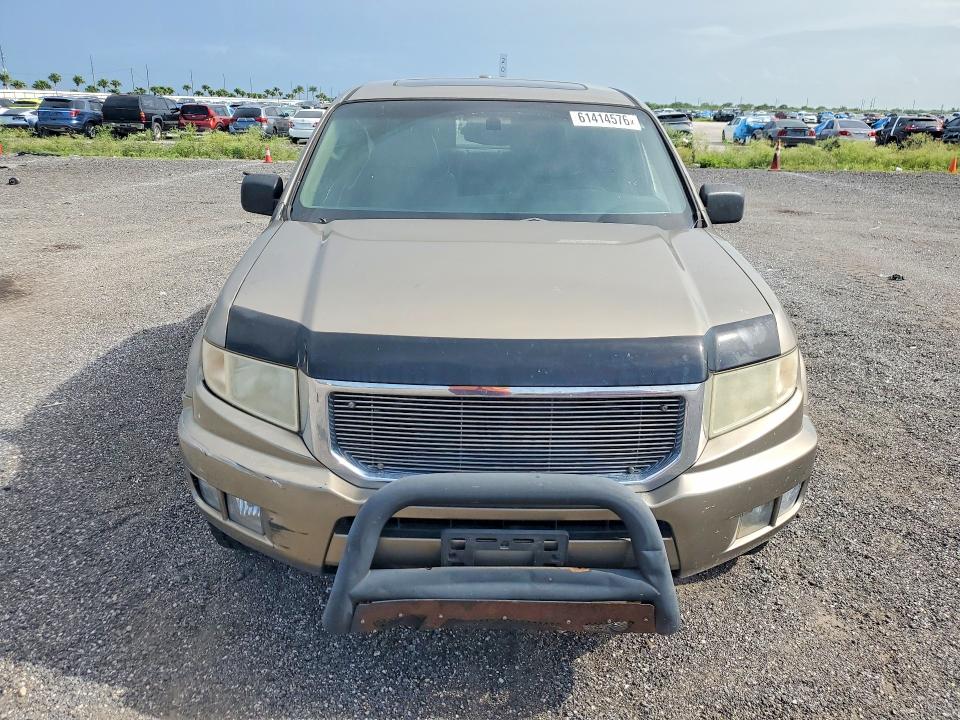 Photo 5 from auction – 2010 HONDA RIDGELINE with VIN 5FPYK1F57AB008516