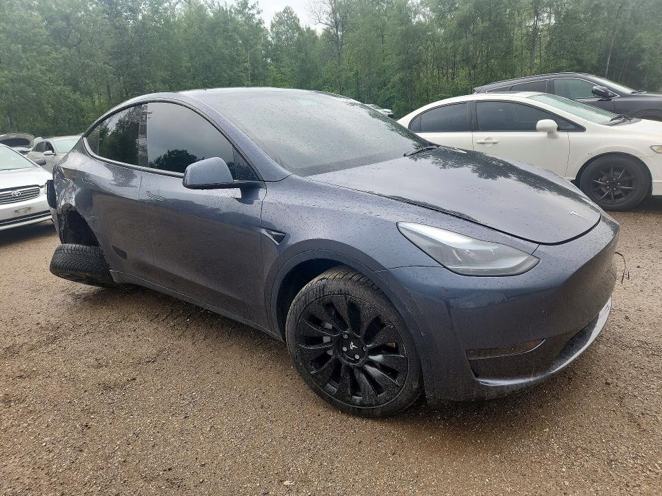 Photo 4 from auction – 2023 TESLA MODEL Y with VIN LRWYGDFD3PC019373