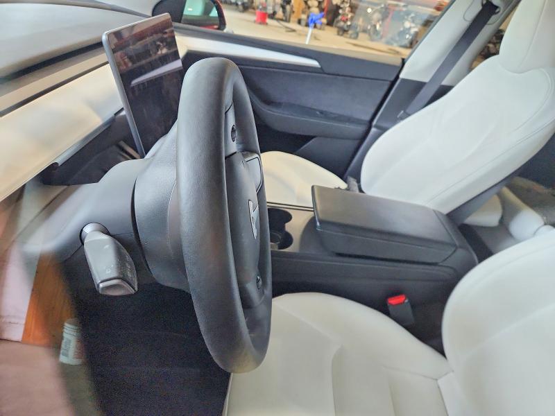 Photo 8 from auction – 2023 TESLA MODEL Y with VIN 7SAYGAEE6PF788810