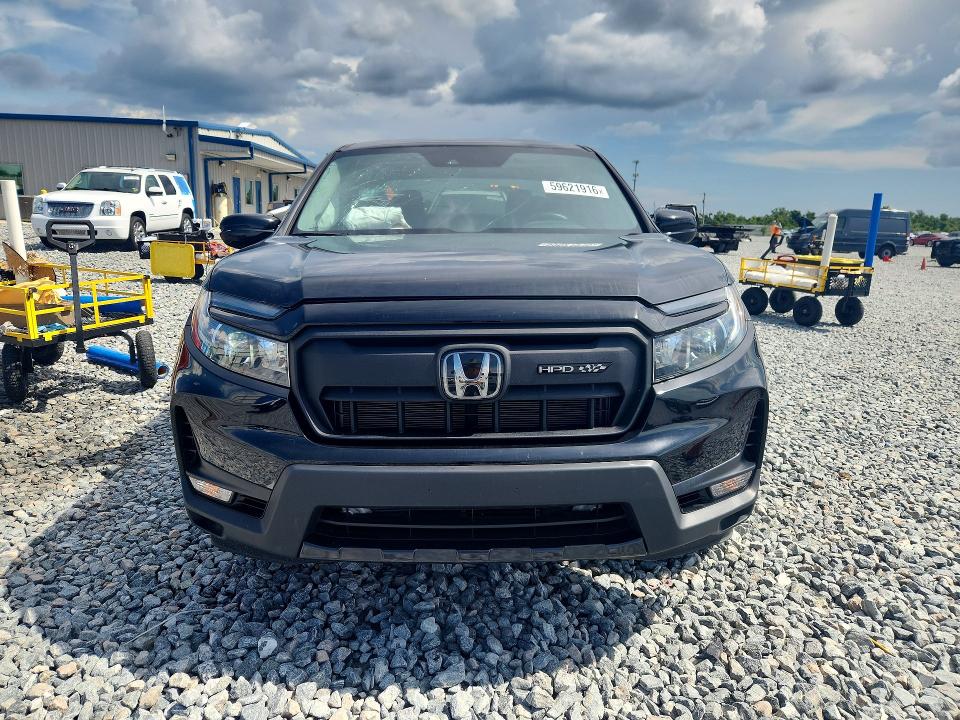 Photo 5 from auction – 2024 HONDA RIDGELINE with VIN 5FPYK3F21RB028192