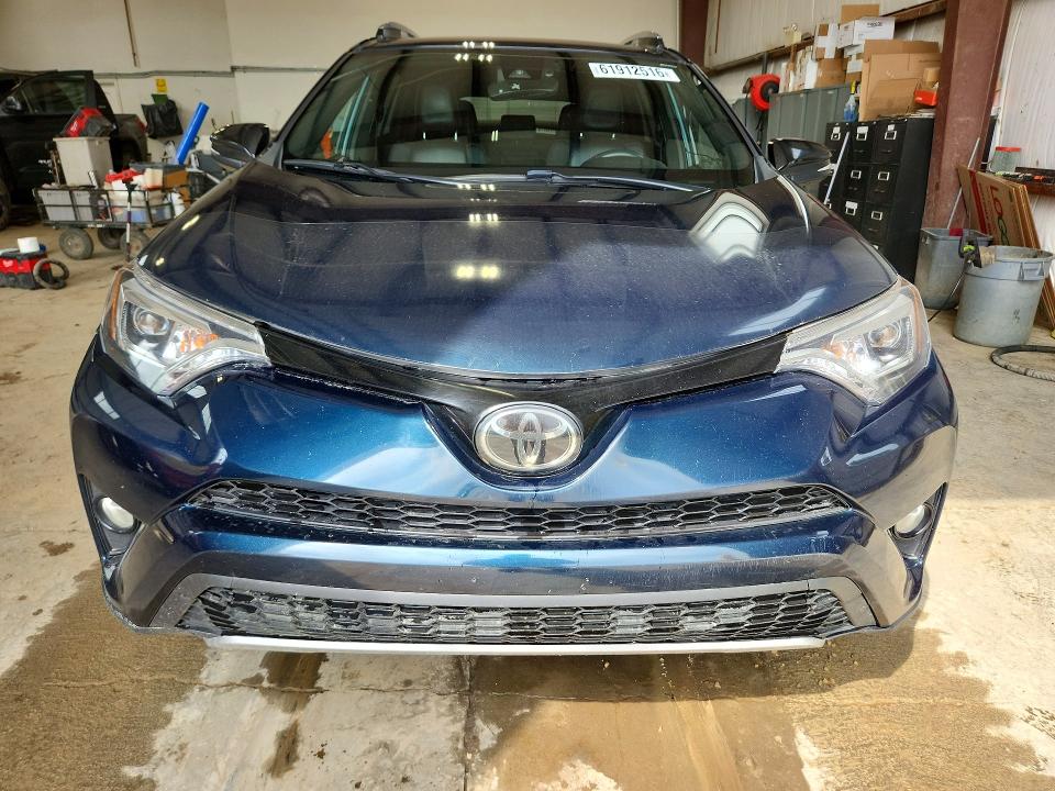 Photo 5 from auction – 2018 TOYOTA RAV4 with VIN 2T3JFREV6JW839420