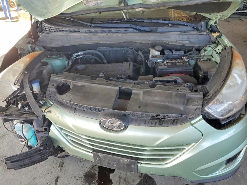 Photo 12 from auction – 2011 HYUNDAI TUCSON with VIN KM8JUCAC7BU229690