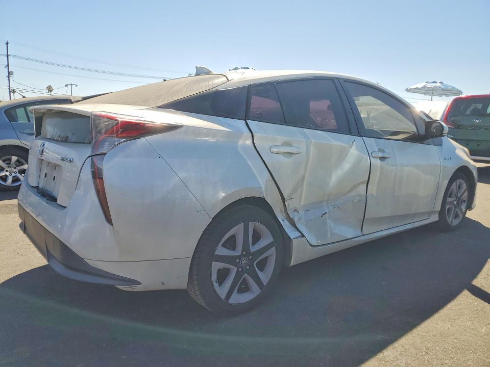 Photo 3 from auction – 2016 TOYOTA PRIUS with VIN JTDKARFUXG3507680