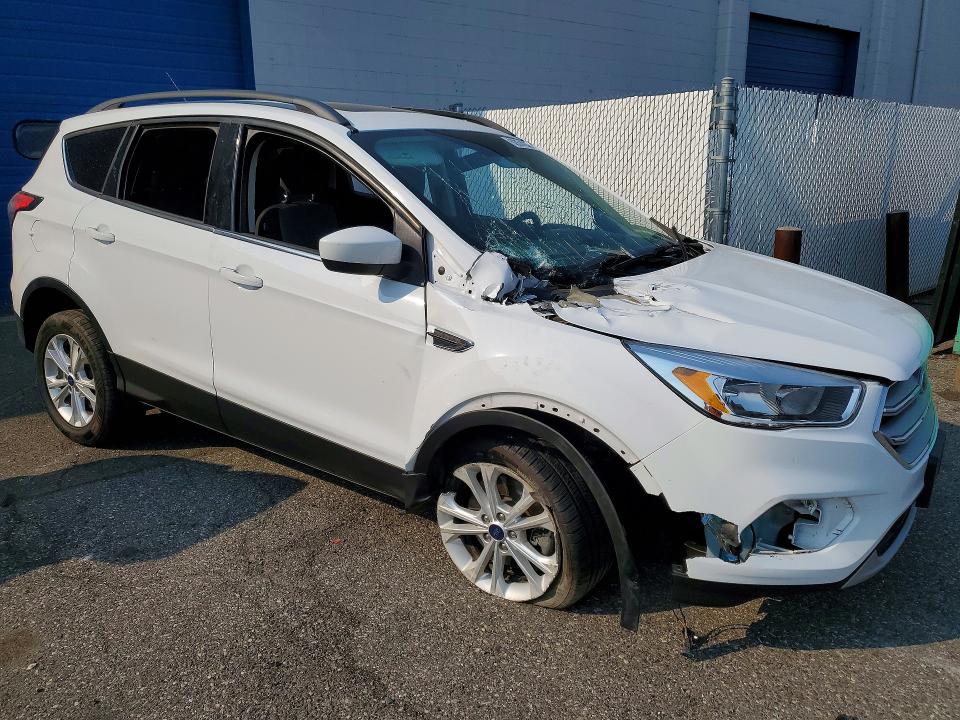 Photo 4 from auction – 2018 FORD ESCAPE with VIN 1FMCU9GD4JUB45563