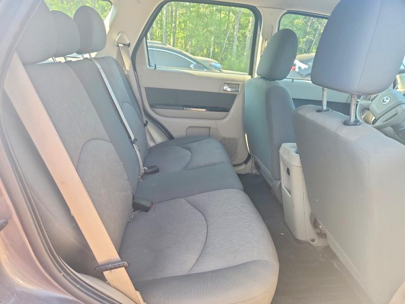 Photo 11 from auction – 2011 MAZDA TRIBUTE with VIN 4F2CY9C77BKM02995