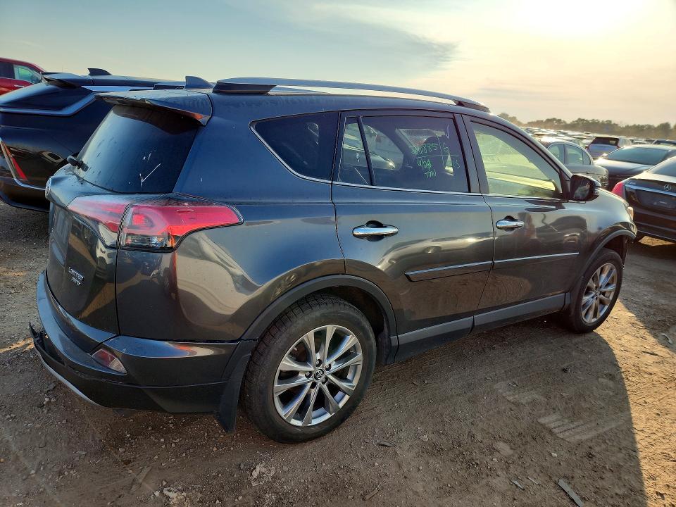 Photo 3 from auction – 2018 TOYOTA RAV4 with VIN JTMDFREV9JD253899