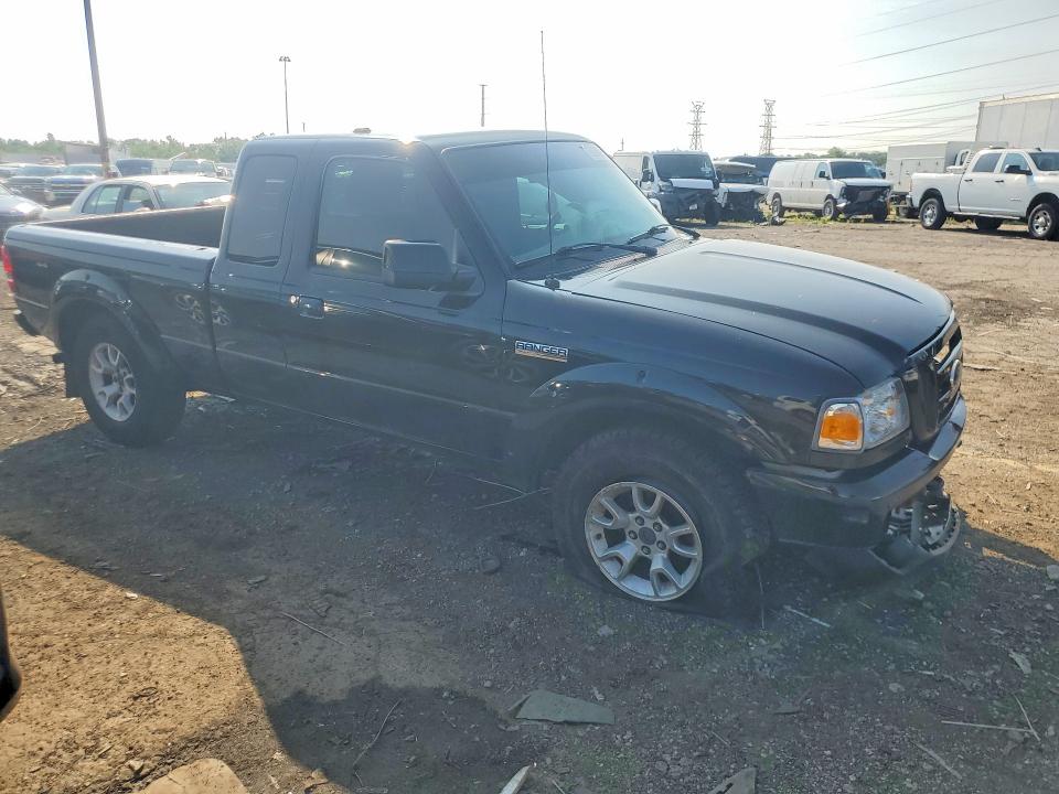 Photo 4 from auction – 2011 FORD RANGER SUPER CAB with VIN 1FTLR4FE8BPA18656