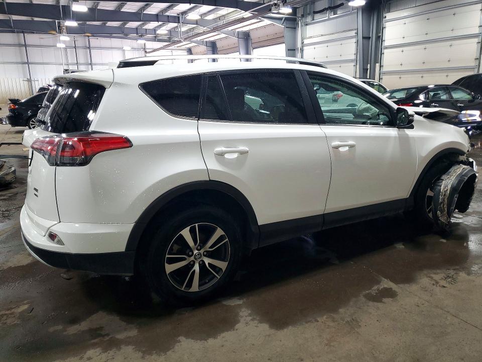 Photo 3 from auction – 2016 TOYOTA RAV4 with VIN 2T3RFREV9GW534702