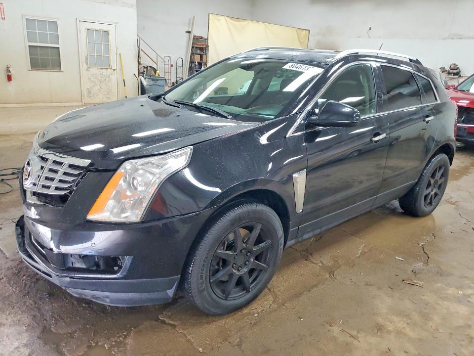 CADILLAC SRX 2015 with VIN 3GYFNEE31FS640693 - Photo from auction