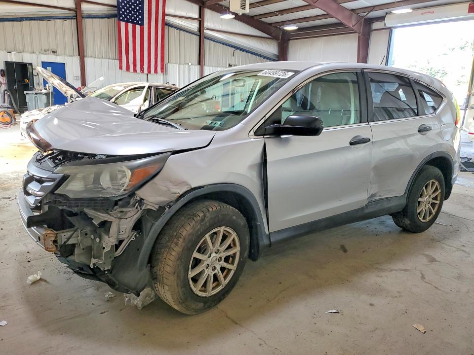 HONDA CR-V 2014 with VIN 2HKRM4H38EH687997 - Photo from auction