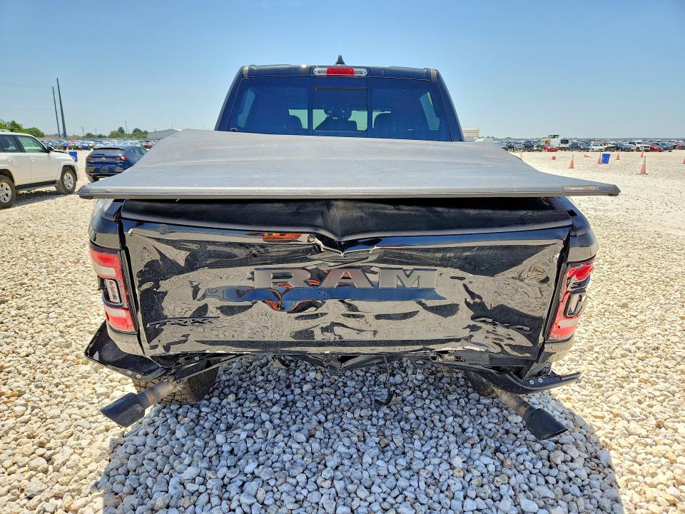 Photo 6 from auction – 2021 RAM 1500 with VIN 1C6SRFU95MN905683