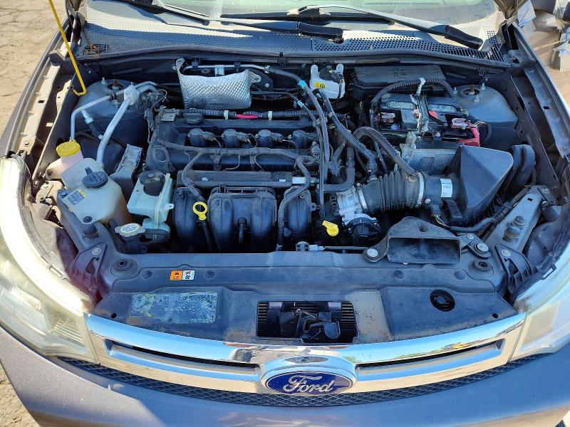 Photo 11 from auction – 2011 FORD FOCUS with VIN 1FAHP3FN4BW181788