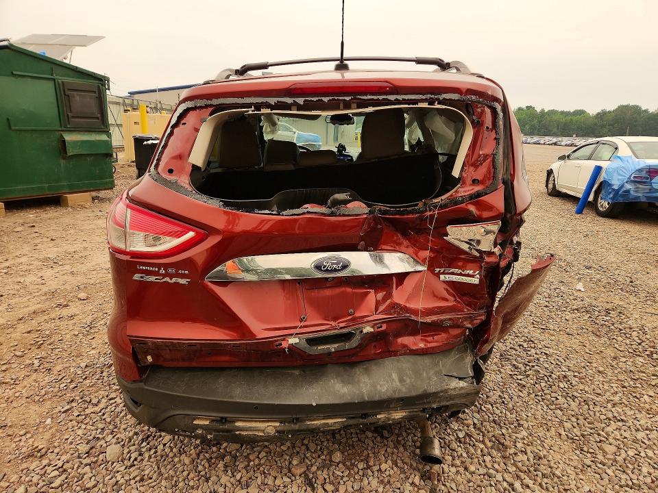 Photo 6 from auction – 2014 FORD ESCAPE with VIN 1FMCU0J93EUB96705