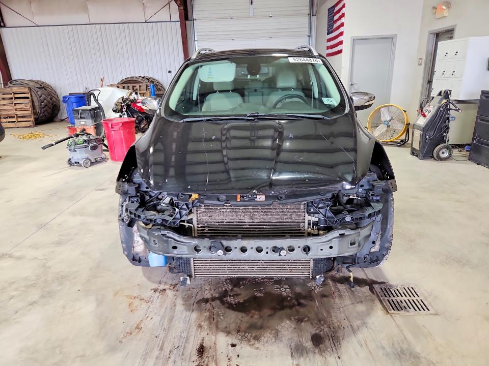 Photo 5 from auction – 2014 FORD ESCAPE with VIN 1FMCU0J98EUD48560