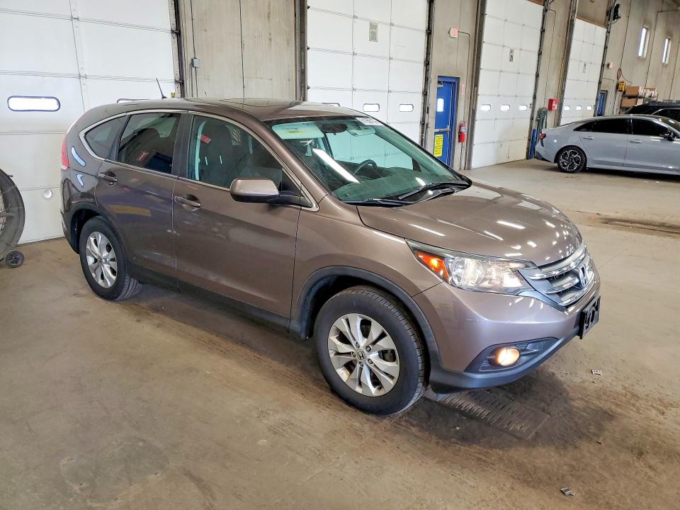 Photo 4 from auction – 2014 HONDA CR-V with VIN 5J6RM4H50EL015603