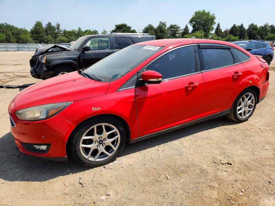 FORD FOCUS 2015 with VIN 1FADP3F21FL283237 - Photo from auction