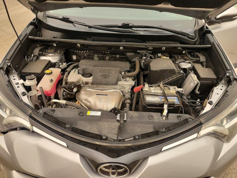 Photo 12 from auction – 2018 TOYOTA RAV4 with VIN 2T3WFREV9JW414294